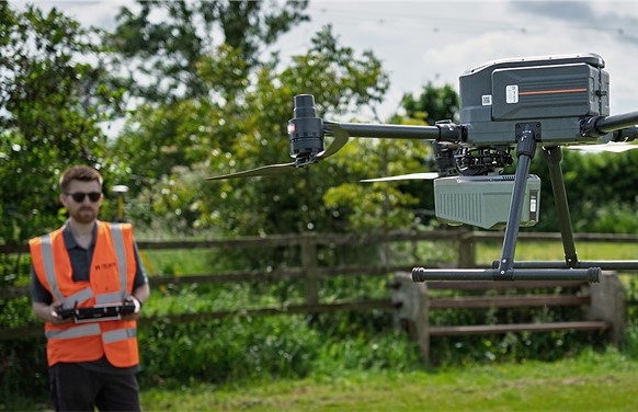 UAV X500 and Alpha Air 10 performing aerial surveying in a countryside area