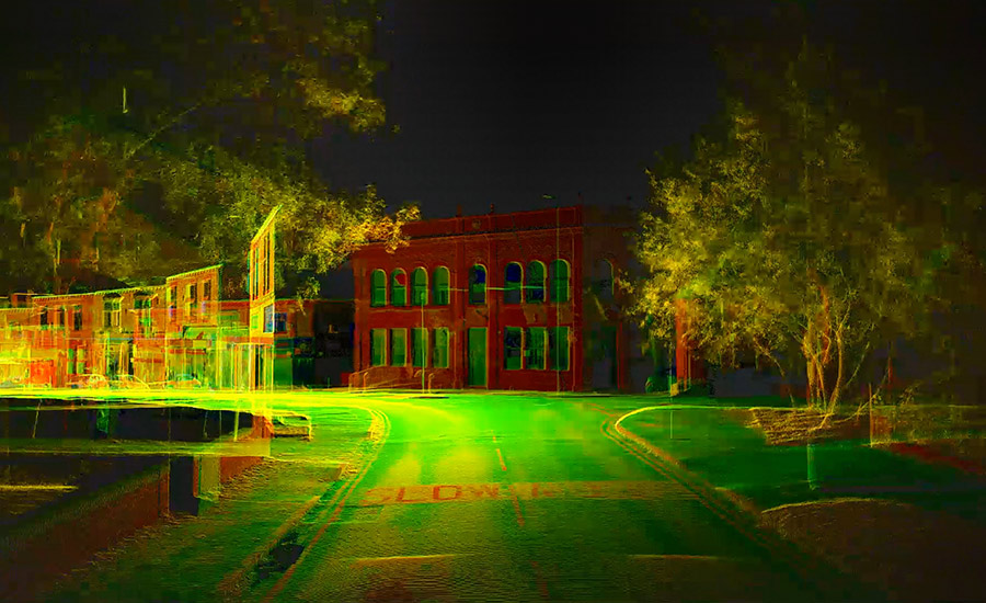 LiDAR point cloud view of a building and surrounding trees captured by CHCNAV mobile mapping system at night