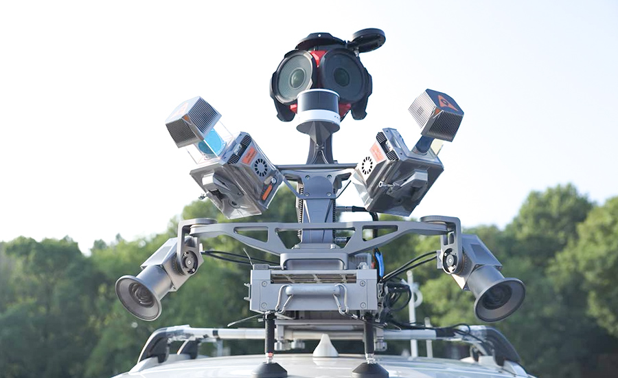 Sistema de cartografia móvel CHCNAV AU20 MMS dual-LiDAR no tejadilho do veículo