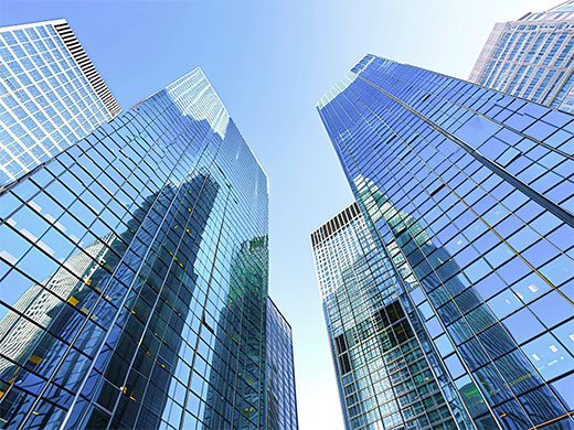 GNSS sensors monitor building subsidence for deformation prevention.