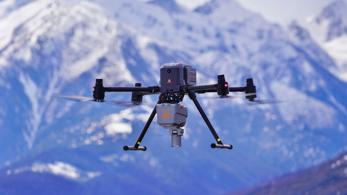CCHCNAV X500 UAV with LiDAR flying over snowy mountains